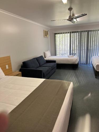 Postel nebo postele na pokoji v ubytování Murgon Motor Inn