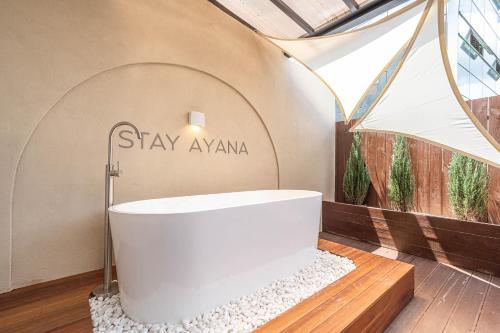 a bathroom with a bath tub in a tent at HOTEL STAY AYANA DAEJEON in Daejeon