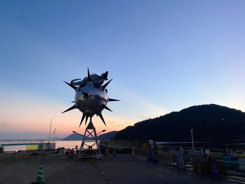 a propeller airplane sitting on top of a building at Hoshinosora in Shodoshima