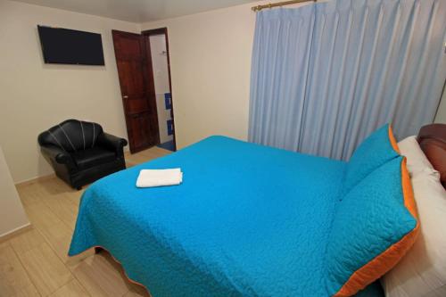 Postel nebo postele na pokoji v ubytování Hostal Plaza by Elvita