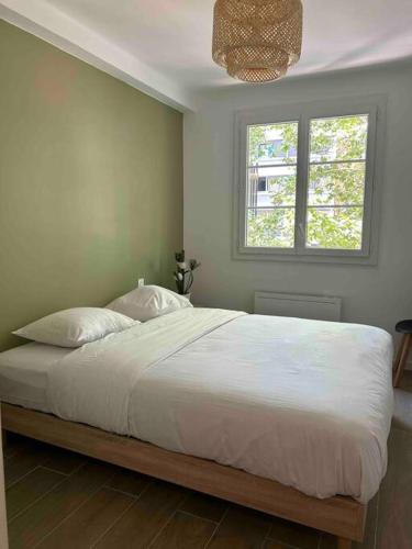 Postel nebo postele na pokoji v ubytování Spacieux T3 Métro Saint Cyprien / 4-8 personnes
