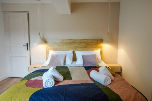 En eller flere senge i et værelse på Le Clos de St Val 4