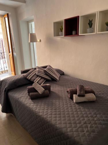 En eller flere senge i et værelse på Casa Barbera