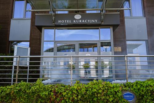 a building with the entrance to a hotel klawery at Hotel Kuracyjny Spa & Wellness in Gdynia