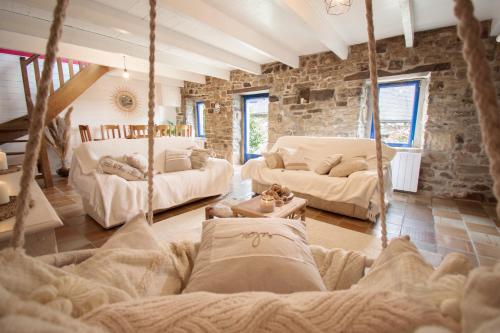 Postel nebo postele na pokoji v ubytování Ti vaen I Maison traditionnelle bretonne & Sauna