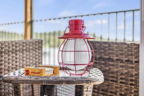 a red lantern sitting on top of a table at Quietside in Camdenton