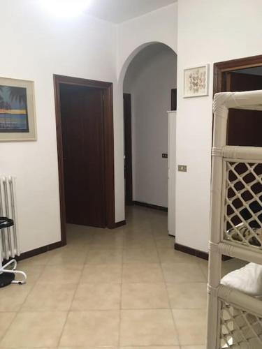 a room with a hallway with a door and a room with a hallwayngthngth at Vacation home Controra, Ginosa (TA) in Ginosa