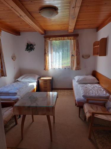 Voodi või voodid majutusasutuse Vila Lipno toas