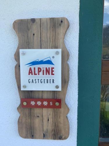 a sign for an airplane catcher on a wall at Ferienwohnung Prantner in Sellrain
