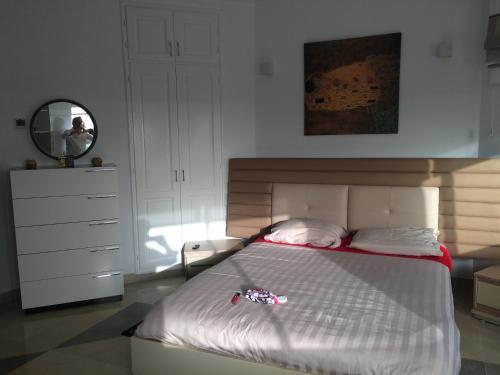 Ein Bett oder Betten in einem Zimmer der Unterkunft Villa Gammarth - Suite N°1