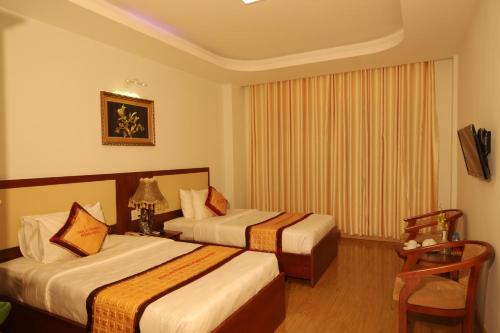 Pleiku Hotel by Gia Lai Touristにあるベッド