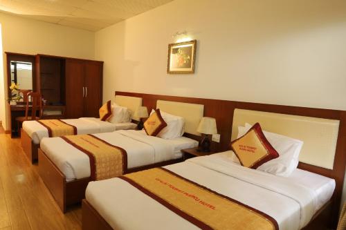 Pleiku Hotel by Gia Lai Touristにあるベッド