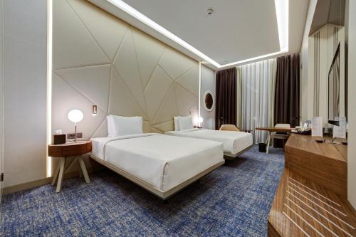 Postel nebo postele na pokoji v ubytování DoubleTree by Hilton Adana