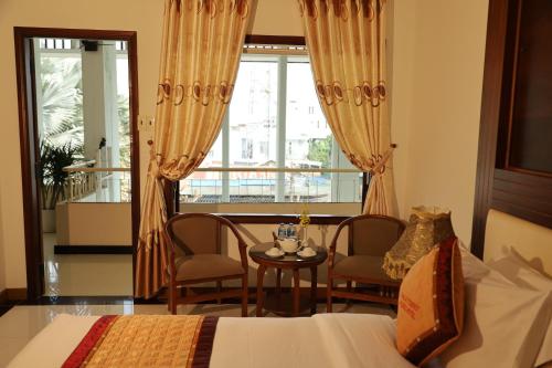 Pleiku Hotel by Gia Lai Touristにあるベッド