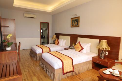 Pleiku Hotel by Gia Lai Touristにあるベッド
