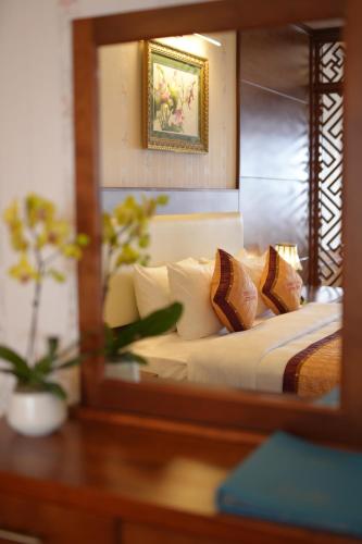 Pleiku Hotel by Gia Lai Touristにあるベッド