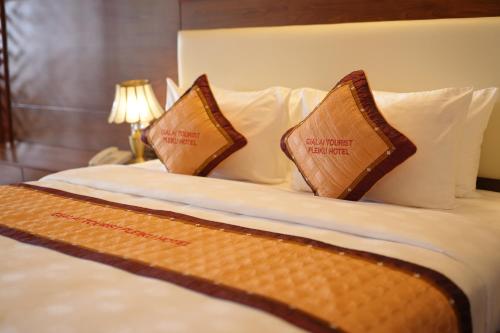 Pleiku Hotel by Gia Lai Touristにあるベッド