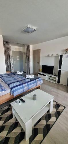 Cama o camas de una habitación en APARTMÁNY BYTČA