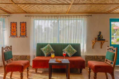 Zona de estar de Tree of Life Birdsong Chalets , Dharamshala