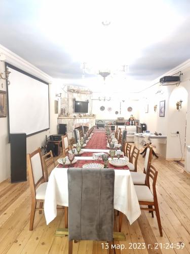 a large dining room with a long table with chairs at Deghceni clubhouse in Dilijan