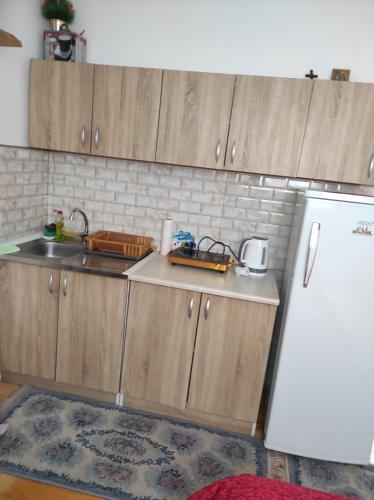 Kuchyň nebo kuchyňský kout v ubytování Apartment Mountain Dream