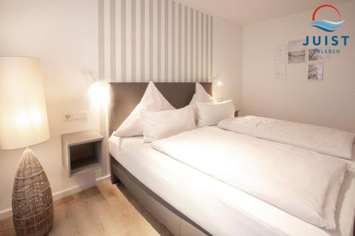Un pat sau paturi într-o cameră la Haus Billstrasse 231 - Wohnung 1