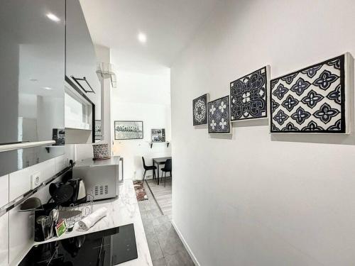 Η κουζίνα ή μικρή κουζίνα στο Cosy appart Perrin 1