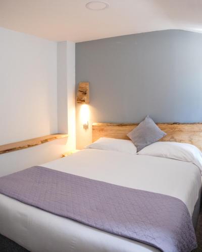 Postel nebo postele na pokoji v ubytování Mullions 51 B&B