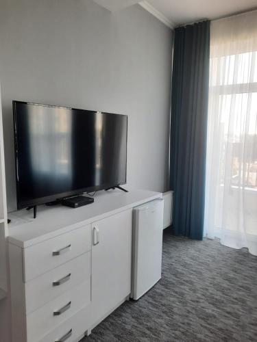 Télévision ou salle de divertissement dans l'établissement Glass Cube Hotel