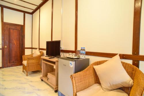 Гостиная зона в Densy Angkor Bungalow