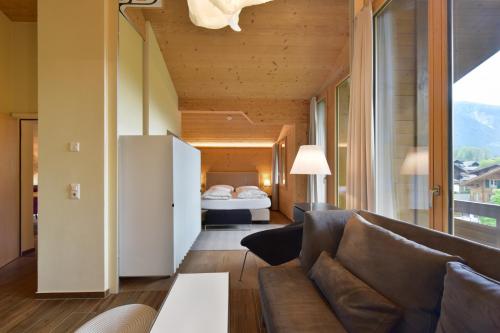 Postel nebo postele na pokoji v ubytování Hotel Krone Lenk