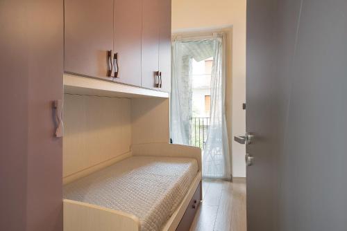 A bed or beds in a room at Nigella Langhe Home
