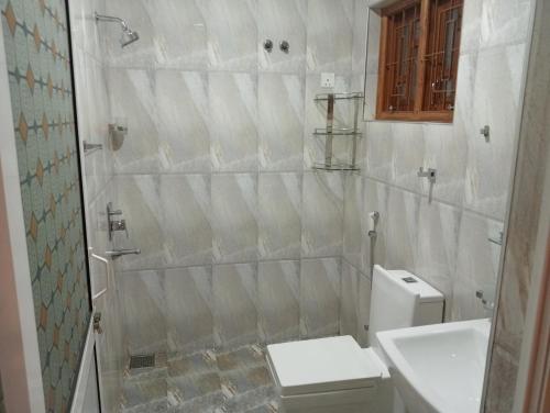 Koupelna v ubytování Thuvaraga Inn