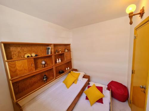 Ένα ή περισσότερα κρεβάτια σε δωμάτιο στο HomeyStay