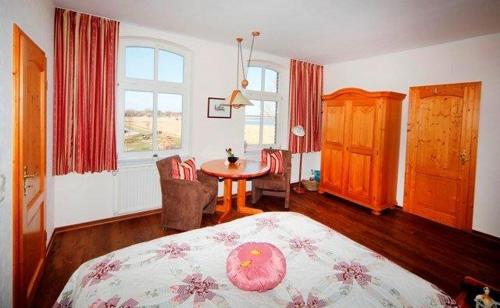 Postel nebo postele na pokoji v ubytování Hotel/Pension Bradhering