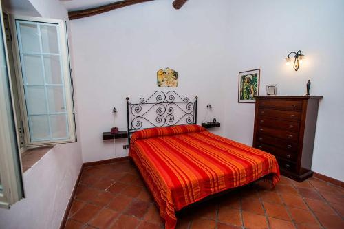 Ένα ή περισσότερα κρεβάτια σε δωμάτιο στο Casa Vacanze Etna