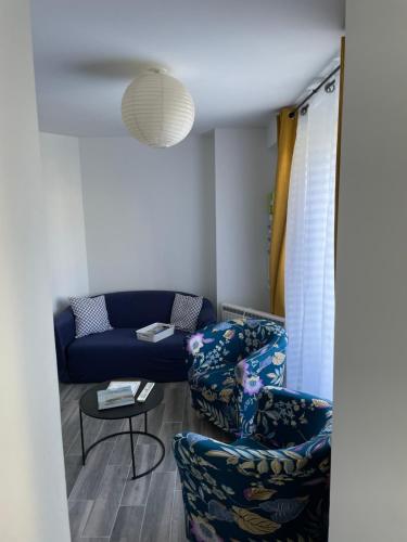 Χώρος καθιστικού στο Appartement RDC