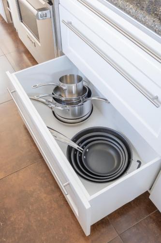 a kitchen drawer with pots and pans in it at 4221 Urban oasis in Hillcrest Mission Hills in San Diego