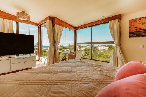 TV/trung tâm giải trí tại Vila Harmonia sua casa na Praia do Preá