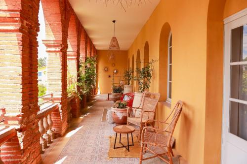 Posezení v ubytování Maison Arcades chambre 3