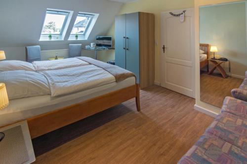 Postel nebo postele na pokoji v ubytování Hotel am Elisabethufer