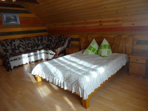 Кровать или кровати в номере Котедж-шале Елітний