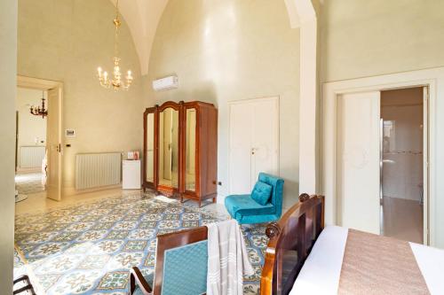 Ένα ή περισσότερα κρεβάτια σε δωμάτιο στο Palazzo Zacà