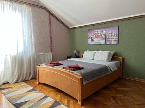 Postel nebo postele na pokoji v ubytování Apartman Stojanović