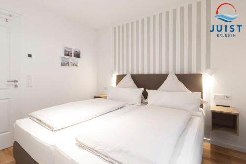 Postel nebo postele na pokoji v ubytování Haus Billstrasse 233 - Wohnung 3