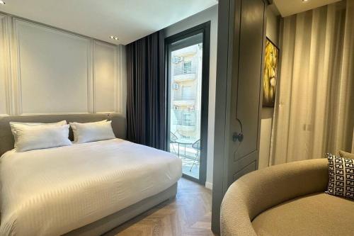 Llit o llits en una habitació de Touch of Luxury - By AppartAli