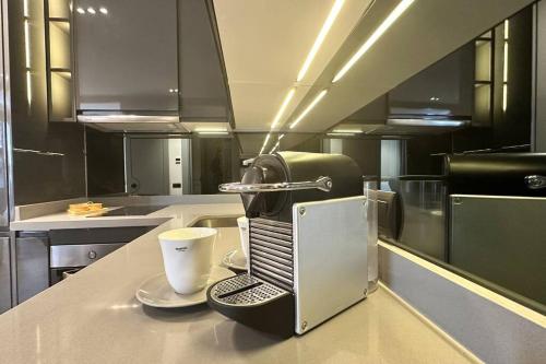 Η κουζίνα ή μικρή κουζίνα στο Touch of Luxury - By AppartAli