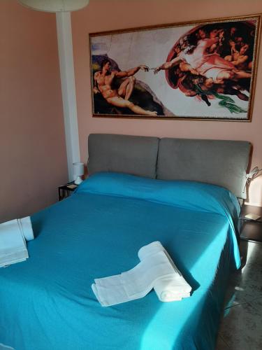 Säng eller sängar i ett rum på Al Crocifisso...da nonna pia