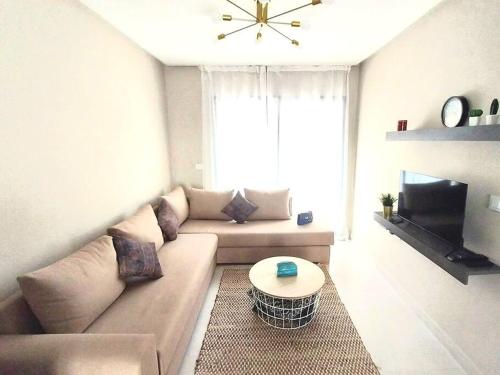 Posezení v ubytování Appartement cosy proche Aéroport