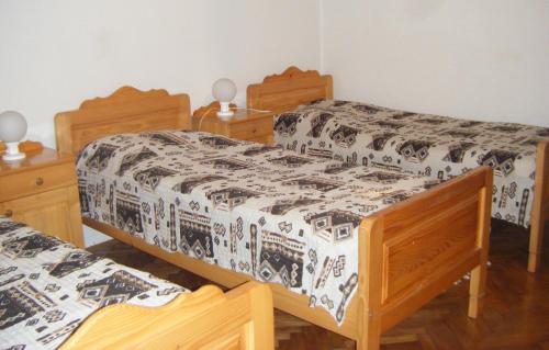 Säng eller sängar i ett rum på Guest House Kmetija